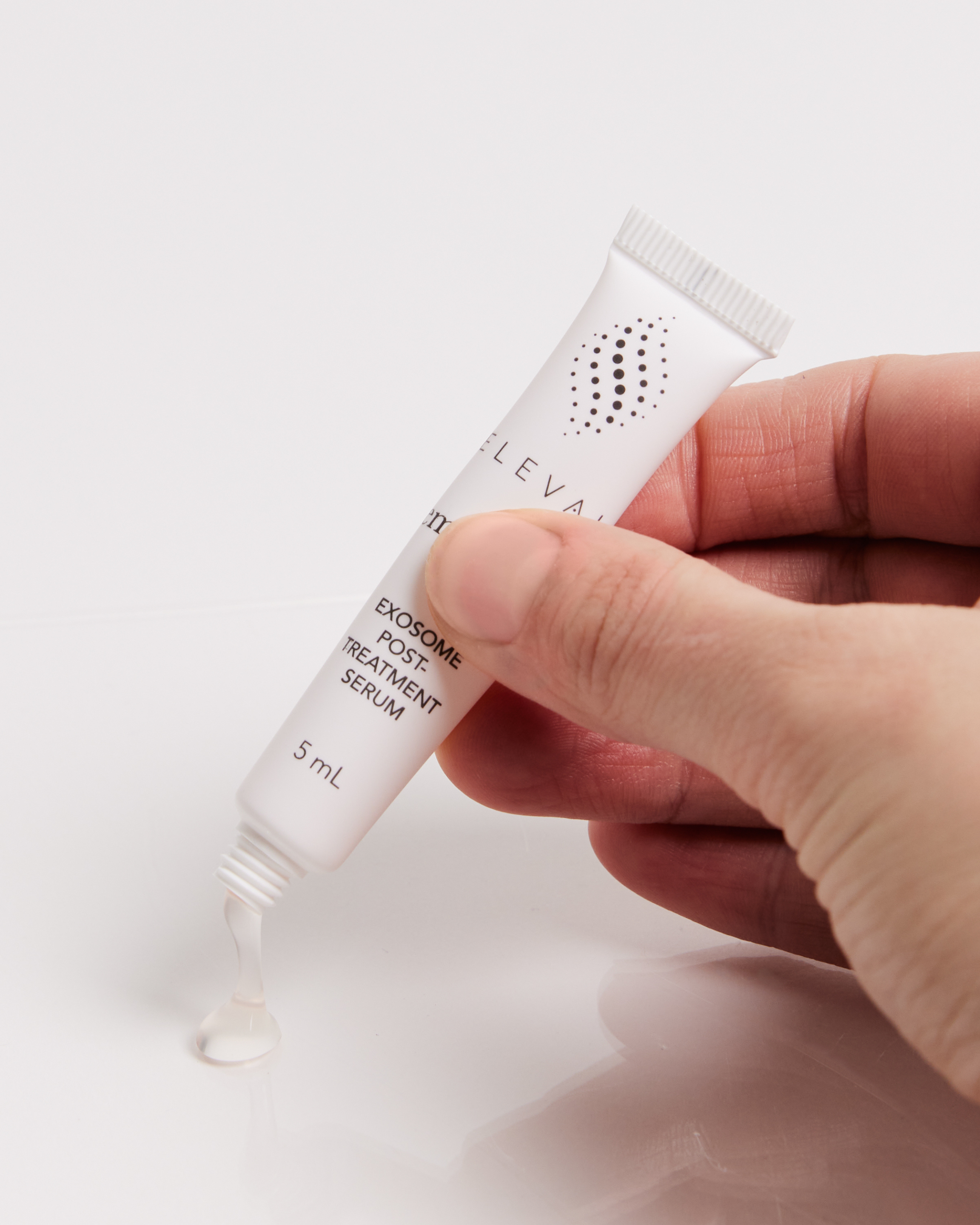 Elevai Empower exosome post-treatment serum tubes beside the Elevai box