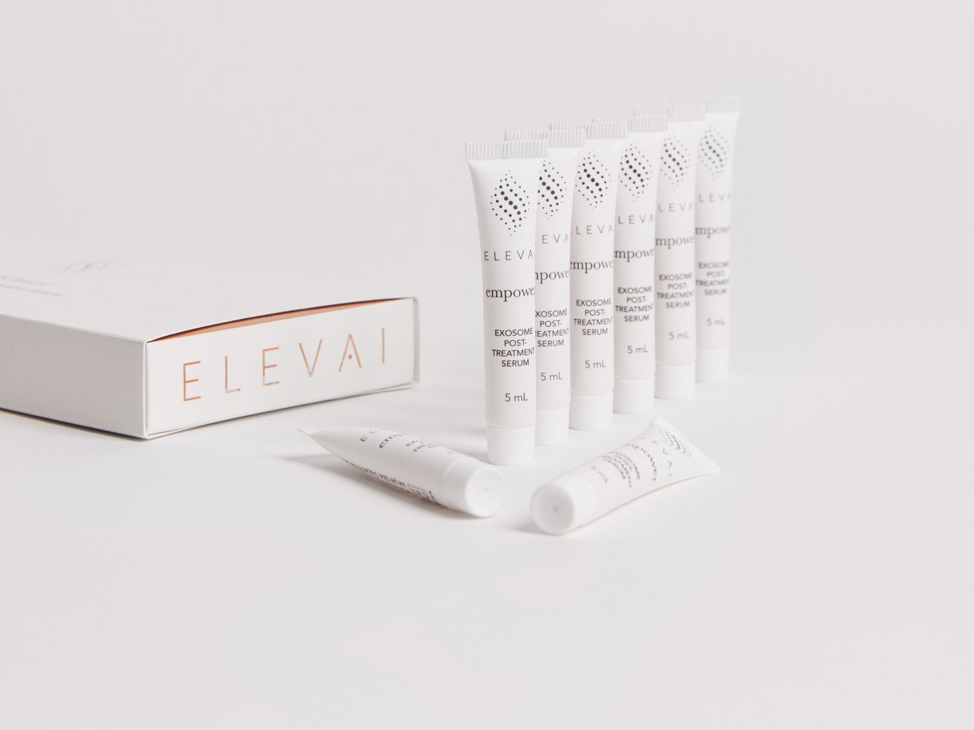 Elevai Empower exosome post-treatment serum tubes beside the Elevai box